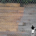 During Picture of Retaining Wall Powerwashing a retaining wall