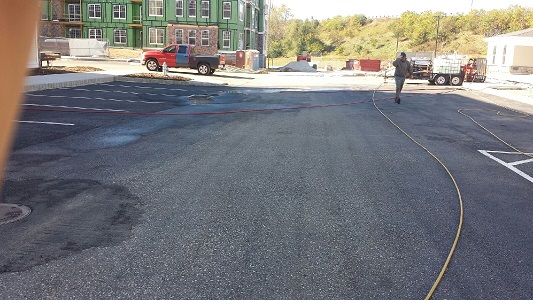 parking lot after pressure washing parking lot after pressure washing